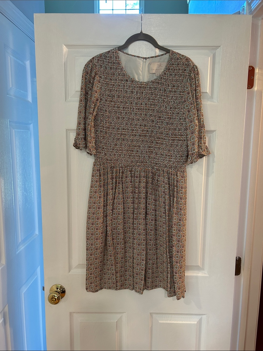 EUC Gal Meets Glam “Piper” Smocked Midi Dress